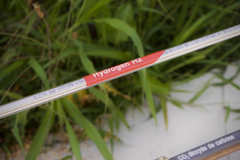 Stainless steel tube carrying hydrogen - the clean fuel of the future.